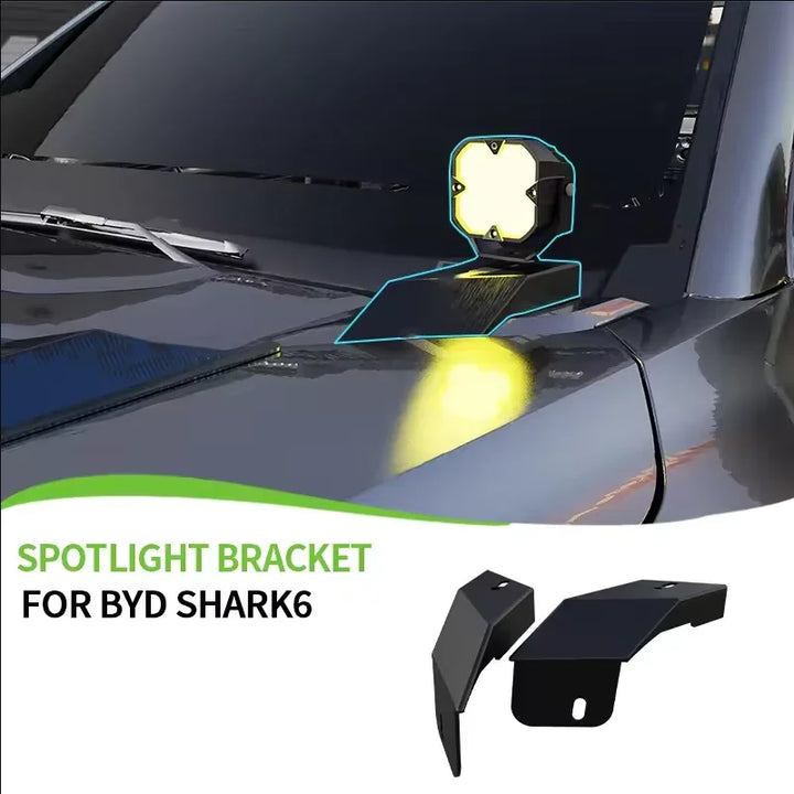 Black matte metal spotlight bracket for BYD Shark 6 mounted on the vehicle hood.