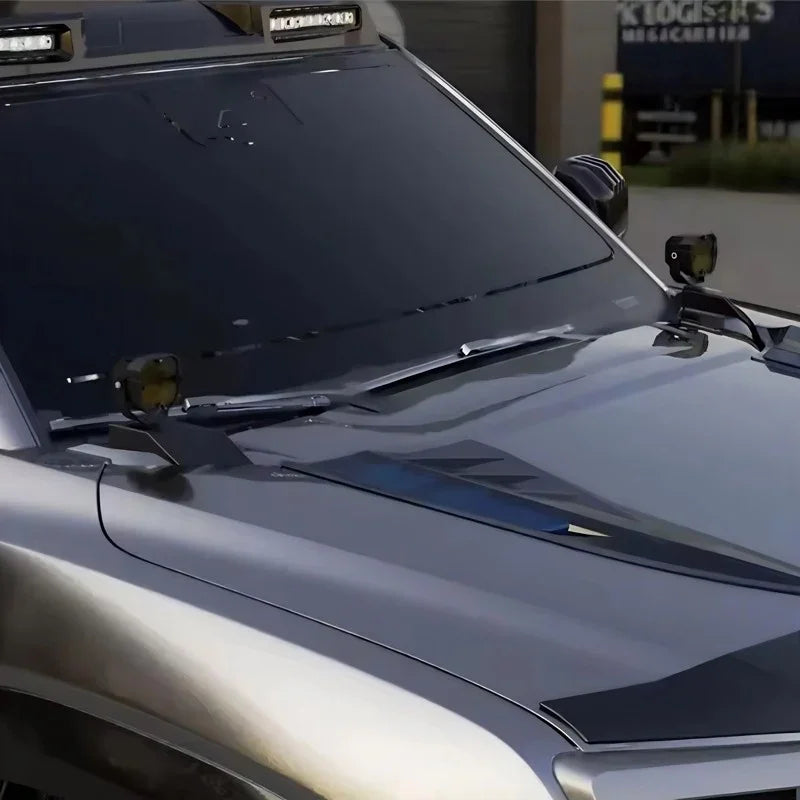 Sleek silver metallic car hood featuring a black carbon fiber accent strip for a premium look.