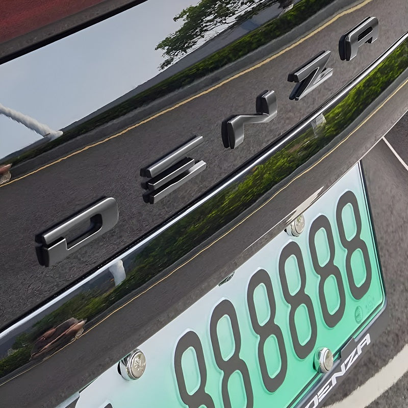 Embellecedor del emblema trasero para DENZA