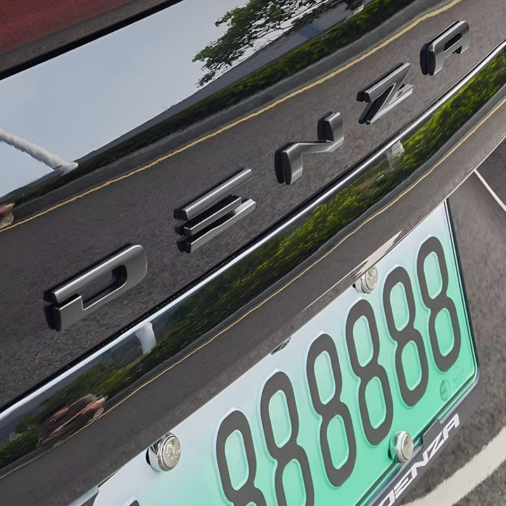 Embellecedor del emblema trasero para DENZA