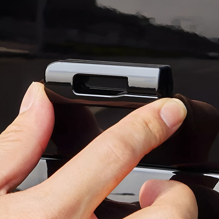 Embellecedor del emblema trasero para DENZA