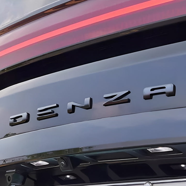 Embellecedor del emblema trasero para DENZA